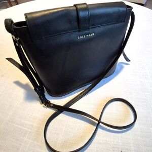 Cole Haan Black purse with Long adjustable strap.